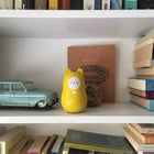 Daruma-Neko dinero del bueno (amarillo) Libero Products