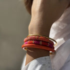 Nepalese Bracelet flamingo/gold beads E47 Maison Kizo