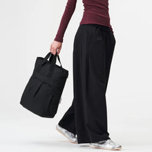 Komo Backpack rooted black pinqponq